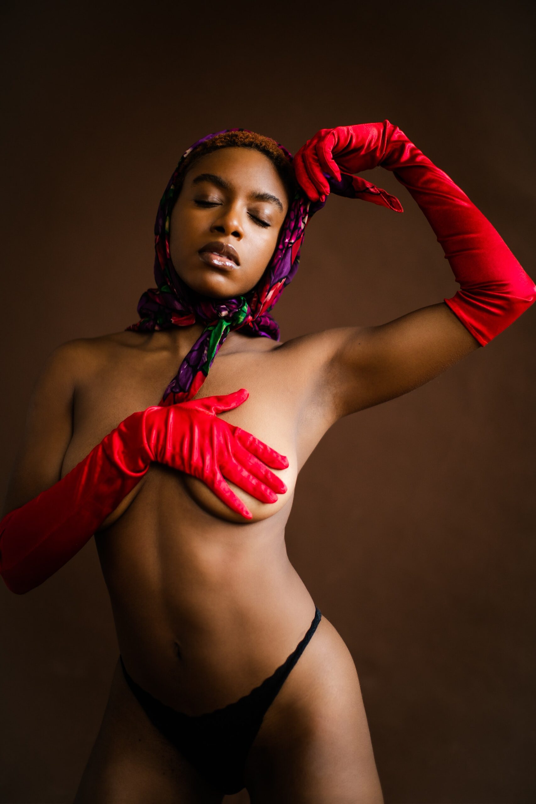 Photo by Arianna Jadé: https://www.pexels.com/photo/woman-in-black-bikini-top-and-red-gloves-4006506/