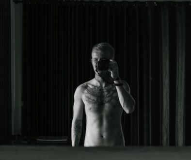 Photo by ArtHouse Studio: https://www.pexels.com/photo/slim-anonymous-tattooed-male-taking-photo-in-mirror-4534229/