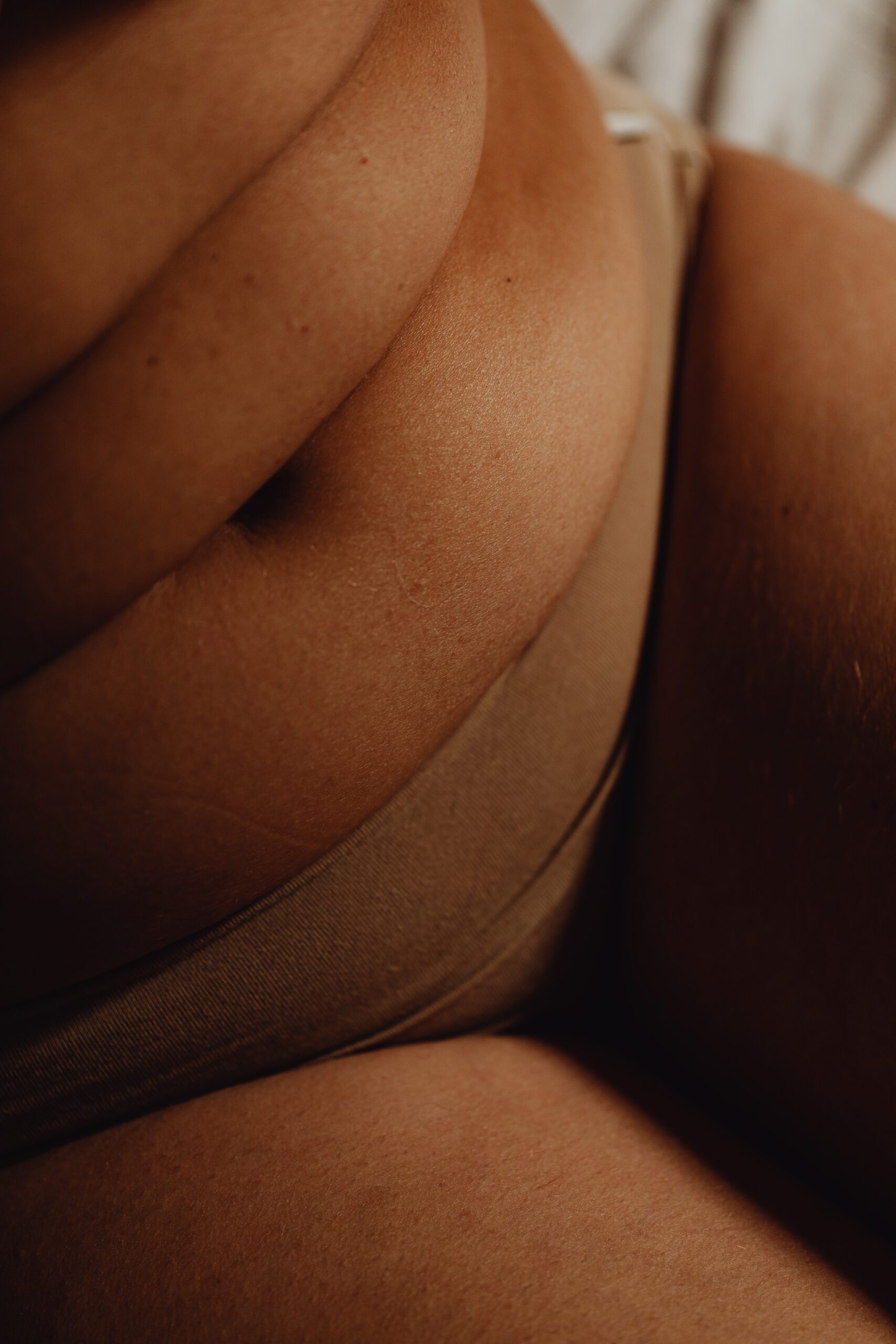 Photo by Karolina Grabowska: https://www.pexels.com/photo/a-woman-s-belly-with-folds-6642952/